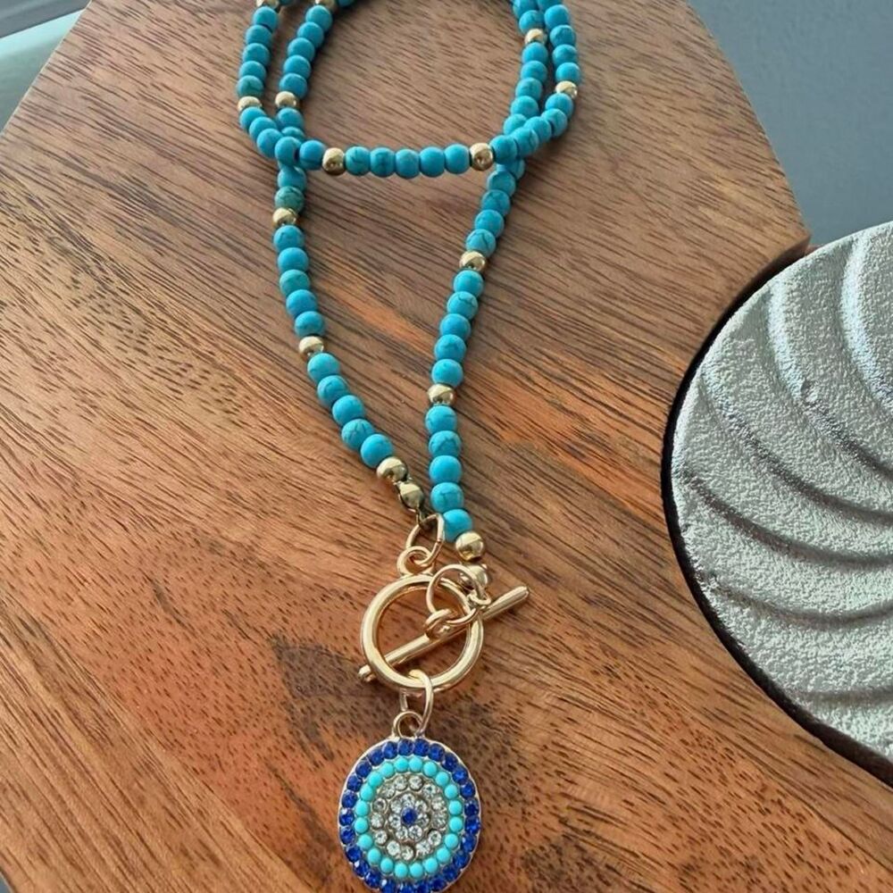 Blue and gold beaded necklace